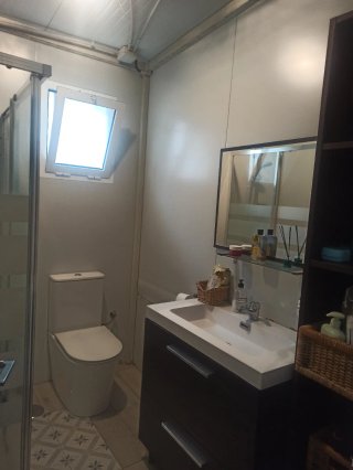 Parcela con casa en urbanización