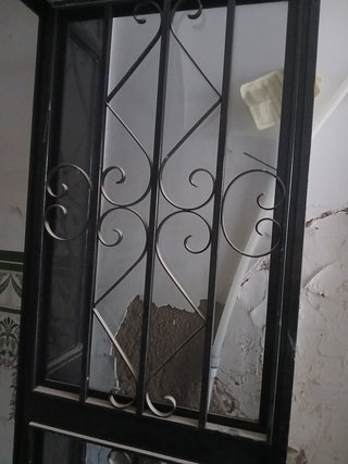 Puerta cancela metálica con arco