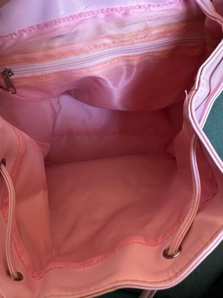 Mochila rosa con apliques artesanales de mandala