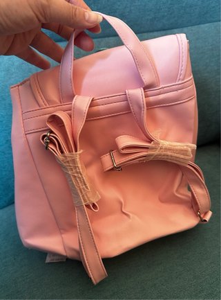 Mochila rosa con apliques artesanales de mandala