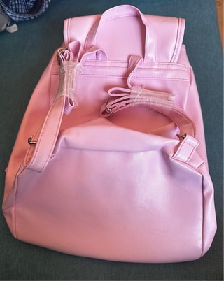 Mochila rosa con apliques artesanales de mandala