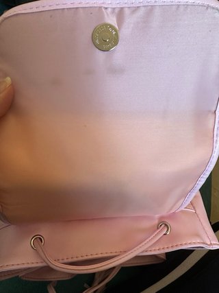 Mochila rosa con apliques artesanales de mandala