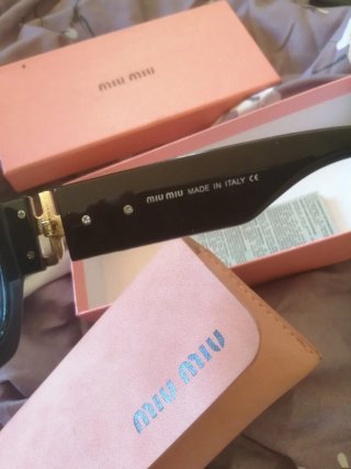 Gafas de sol Miu Miu MU 09WS Negras