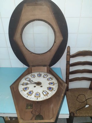 Reloj ojo de buey antiguo