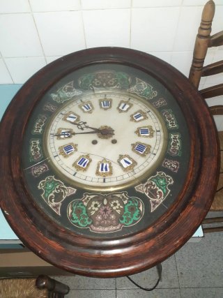 Reloj ojo de buey antiguo