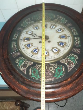Reloj ojo de buey antiguo