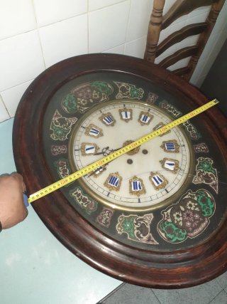 Reloj ojo de buey antiguo