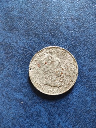 Moneda antigua dorada
