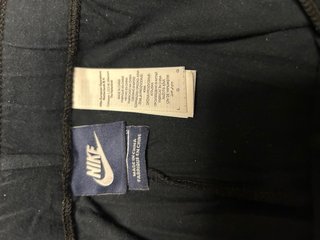 Mallas Nike Mujer Negras con Logo Rosa