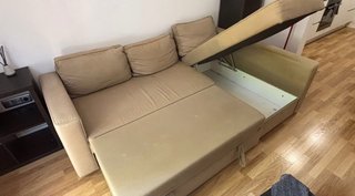 Sofá cama beige con almacenaje