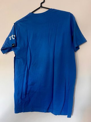 Camiseta Joma Grand Prix Azul y amarilla.