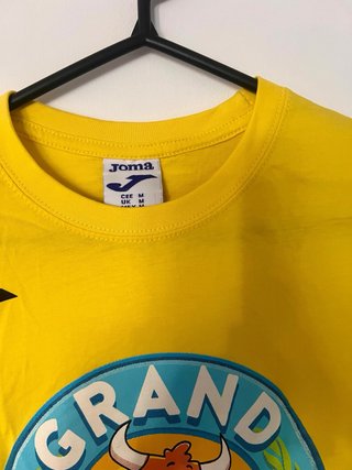 Camiseta Joma Grand Prix Azul y amarilla.