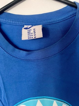 Camiseta Joma Grand Prix Azul y amarilla.