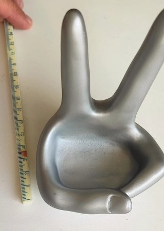 Soporte teléfono mano plástico plateado