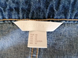 Salopette gonna in denim blu.