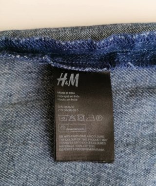 Salopette gonna in denim blu.