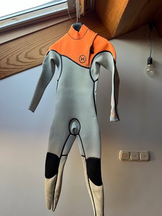 Traje de neopreno infantil naranja y gris DEEPLY.
