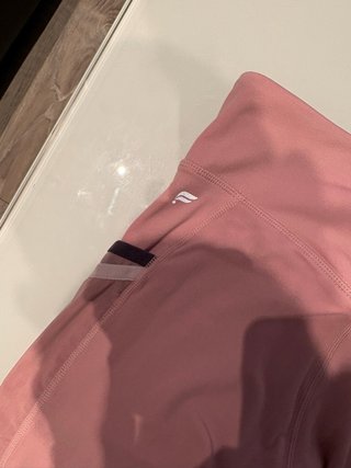 Mallas Fabletics rosas con bolsillos