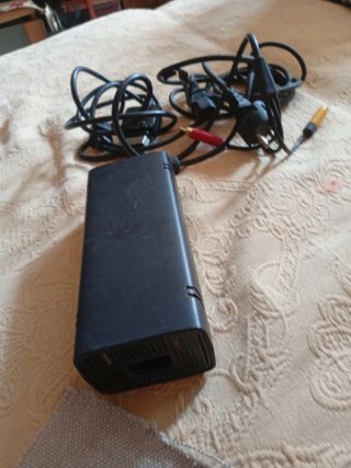 Xbox 360 con adaptador de corriente