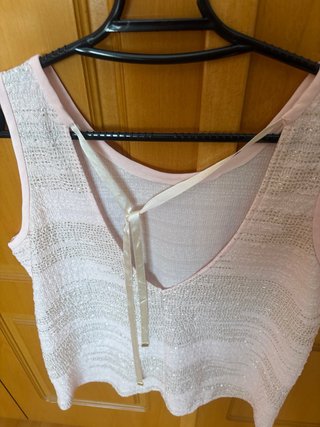 Top rosa con brillos
