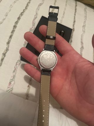 Reloj y boli Unicaja antiguo