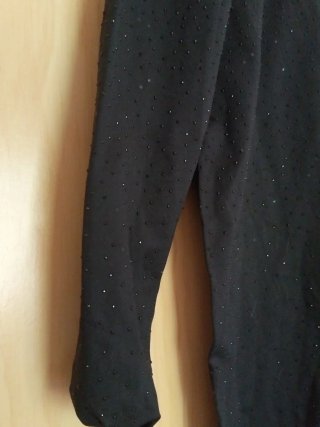 Mono negro con brillos