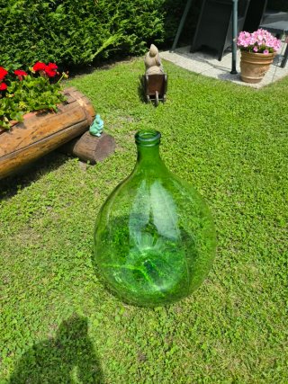 Damigiana di vetro verde grande ornamentale