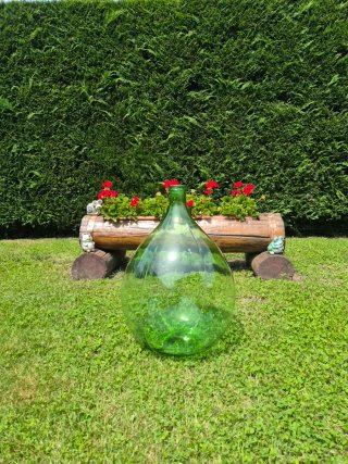 Damigiana di vetro verde grande ornamentale