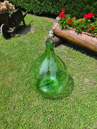 Damigiana di vetro verde grande ornamentale