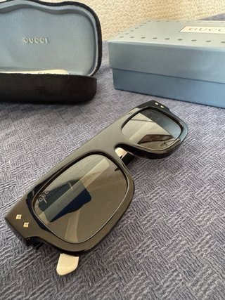 Occhiali da sole Gucci neri e marroni
