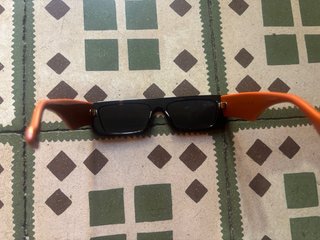 Occhiali da sole Gucci arancione e nero