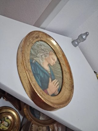 Antica cornice ovale dorata