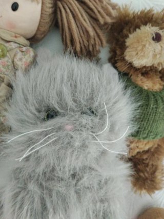 Lote de peluches: oso, mono, perro y muñeca