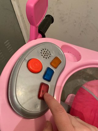 Triciclo infantil rosa con empujador