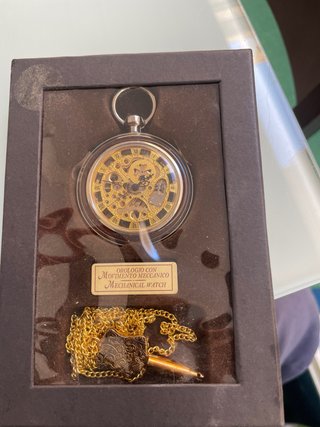 Reloj de bolsillo esqueleto dorado