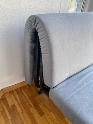 Sofá Cama Gris Tela y Metal Con su funda blanca