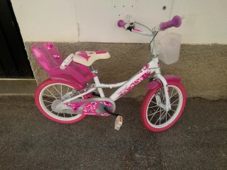 Bicicleta infantil rosa y blanca