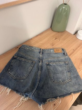 Shorts vaqueros con flecos