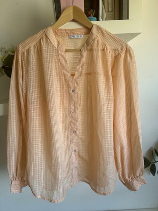 Blusa in colore pesca. M/L