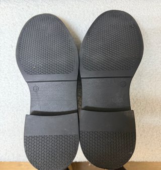 Zapatos negros tipo mocasín
