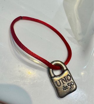 Bolsa, pulsera y trapito UNO de 50