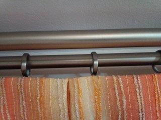 Cortinas Salón Beige y Naranja con Barra
