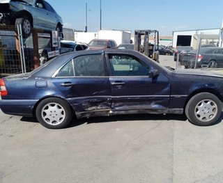 Mercedes 5216960 faro izquierdo 0301036201 clase c
