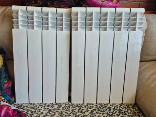 Radiador blanco de metal uno de 4 y otro de 5