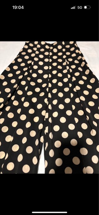 Pantalón lunares vestir negro y beige
