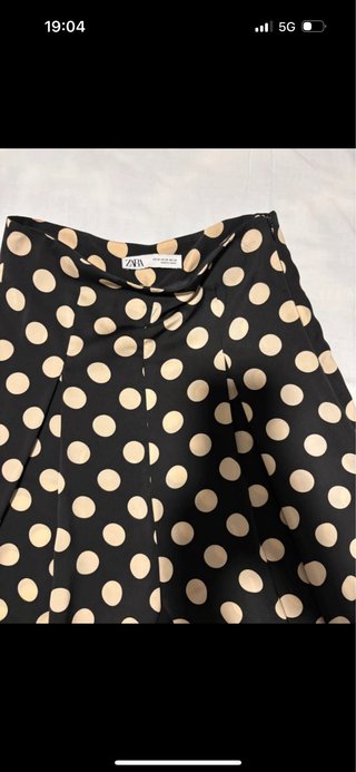 Pantalón lunares vestir negro y beige