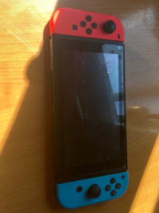 Nintendo Switch Roja y Azul + 4 Juegos