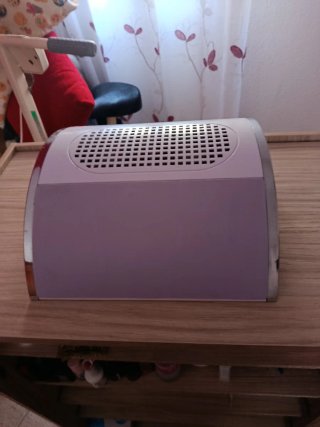 Extractor de polvo para uñas