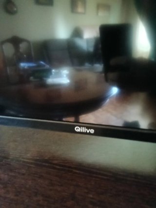 TV Qilive 32 Negra/Azul  Comprada hace Una semana.