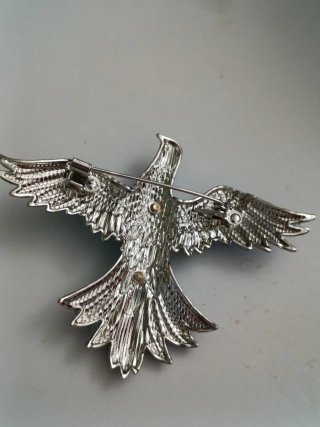 Broche pájaro azul con pedrería joyas bisutería